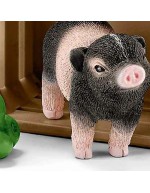 Mini cerdo con manzanas
