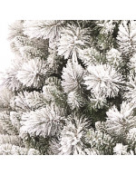 Detalle cubierto de nieve de pino navideño flocado imperio blanco